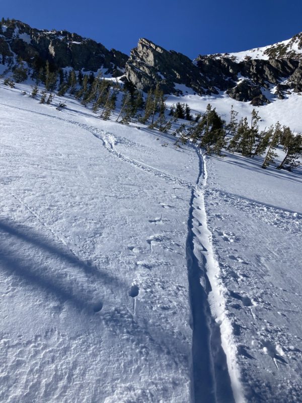 Slight rolling transport of low density surface snow refilling skin track in some locations.