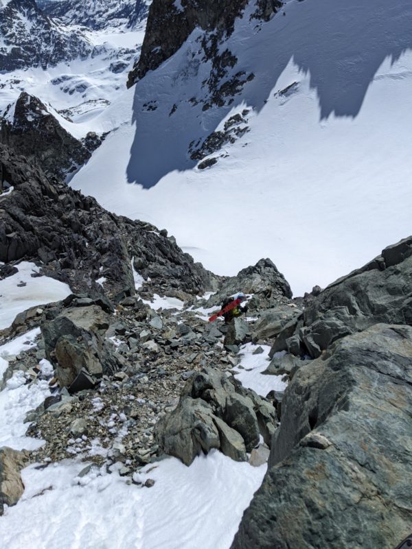 The gully of ritter is quite rocky and made for challenging travel both up and down in ski boots.  Be sure and  bring you helmet.