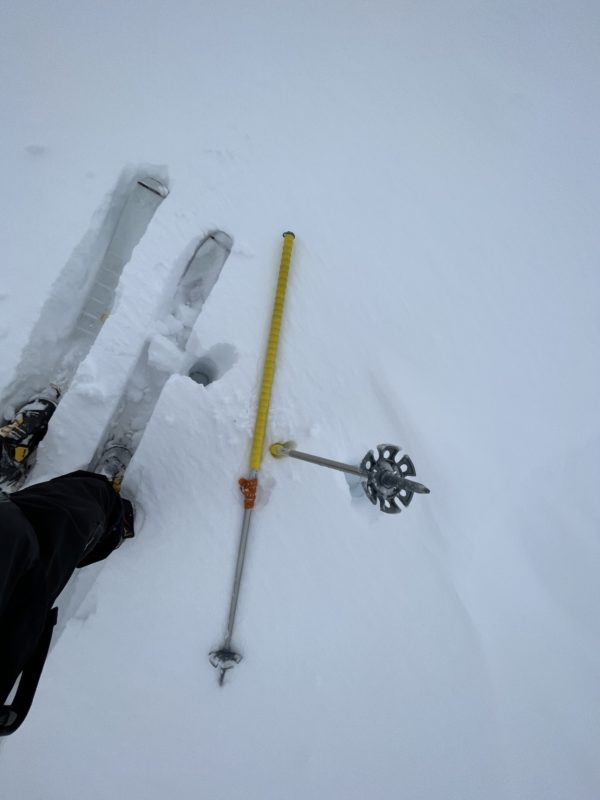 Approximately .5meters of snow on ridge line.  Snow was deeper along wind loaded faces. 