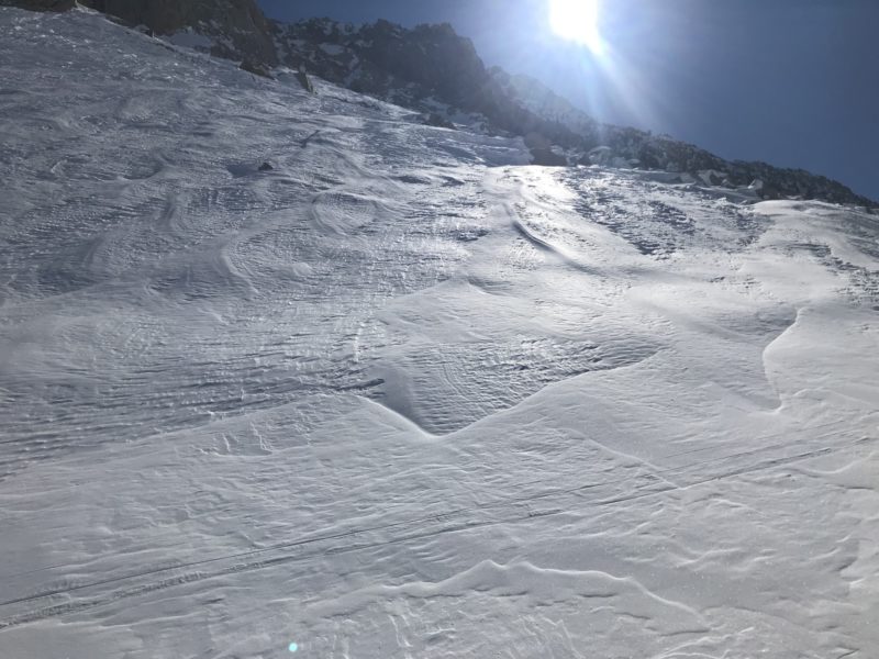 Wind affected snow below Cardinal Pinnacle.