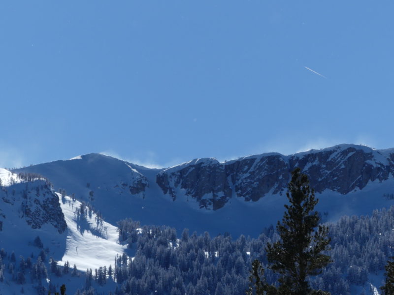 Blowing snow from increasing northeast winds across the Mammoth Crest in the early afternoon