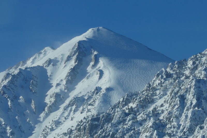 Blowing snow and evidence of significant wind effect at high elevations. This is The Bumpkin on top of wheeler crest ~12k' taken from the grade. 