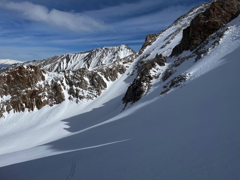 20230220 Pine Creek: Variations in snow surface within the path and terrain feature scale above treeline. Wind scoured, wind loaded, wind hardened and weak faceted surface snow (skin track).