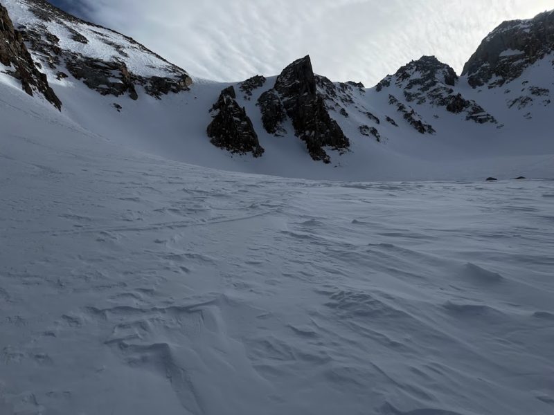 20230220 Pine Creek: Variations in snow surface within the path and terrain feature scale above treeline. Wind scoured, wind loaded, wind hardened and weak faceted surface snow (skin track).